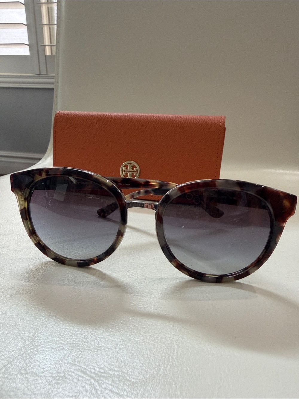 Tory Burch Tortoiseshell Round Sunglasses with Orange Case